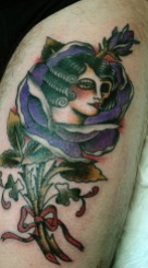 traditional tattoo ose lady in a rose